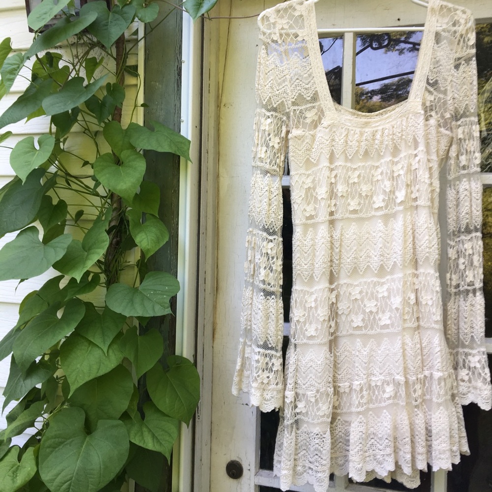 White lace dress with bell sleeves